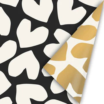 Cadeaupapier met grote hartjes op zwarte achtergrond en goudkleurige binnenzijde – 30 cm breed en 2 meter lang, stijlvol voor romantische en feestelijke cadeaus.