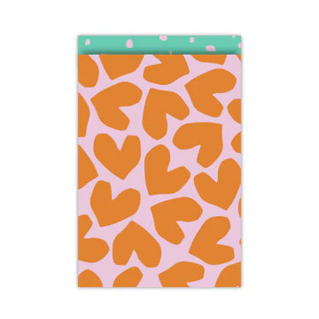 Cadeauzakje L met oranje XL harten op roze achtergrond en mintgroene binnenzijde – Liefs en Lintjes