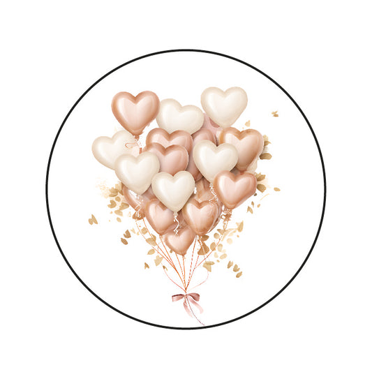 Ronde sticker met illustratie van roze en crème hartjesballonnen met strikje – Liefs en Lintjes